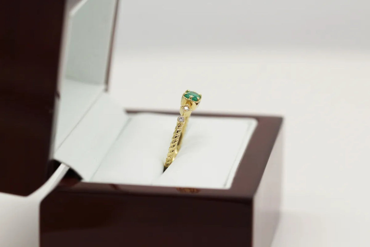14KT Yellow Gold Emerald and Diamond Ring on Rope Band Gillespie Fine Jewelers