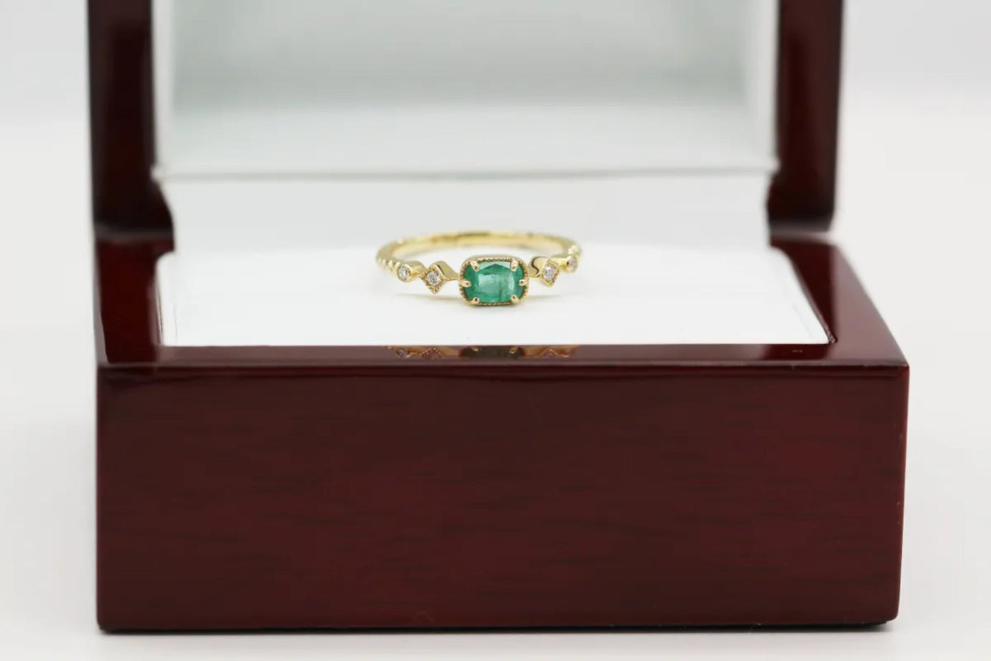 14KT Yellow Gold Emerald and Diamond Ring on Rope Band Gillespie Fine Jewelers