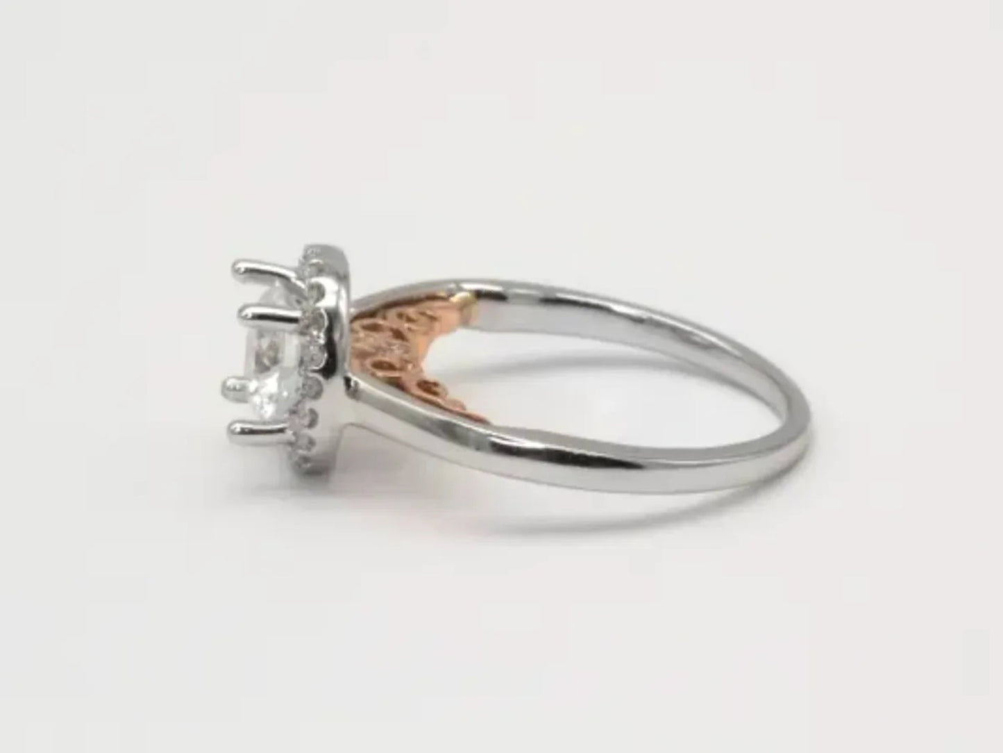 White and Rose Gold Halo Engagement Ring Gillespie Fine Jewelers