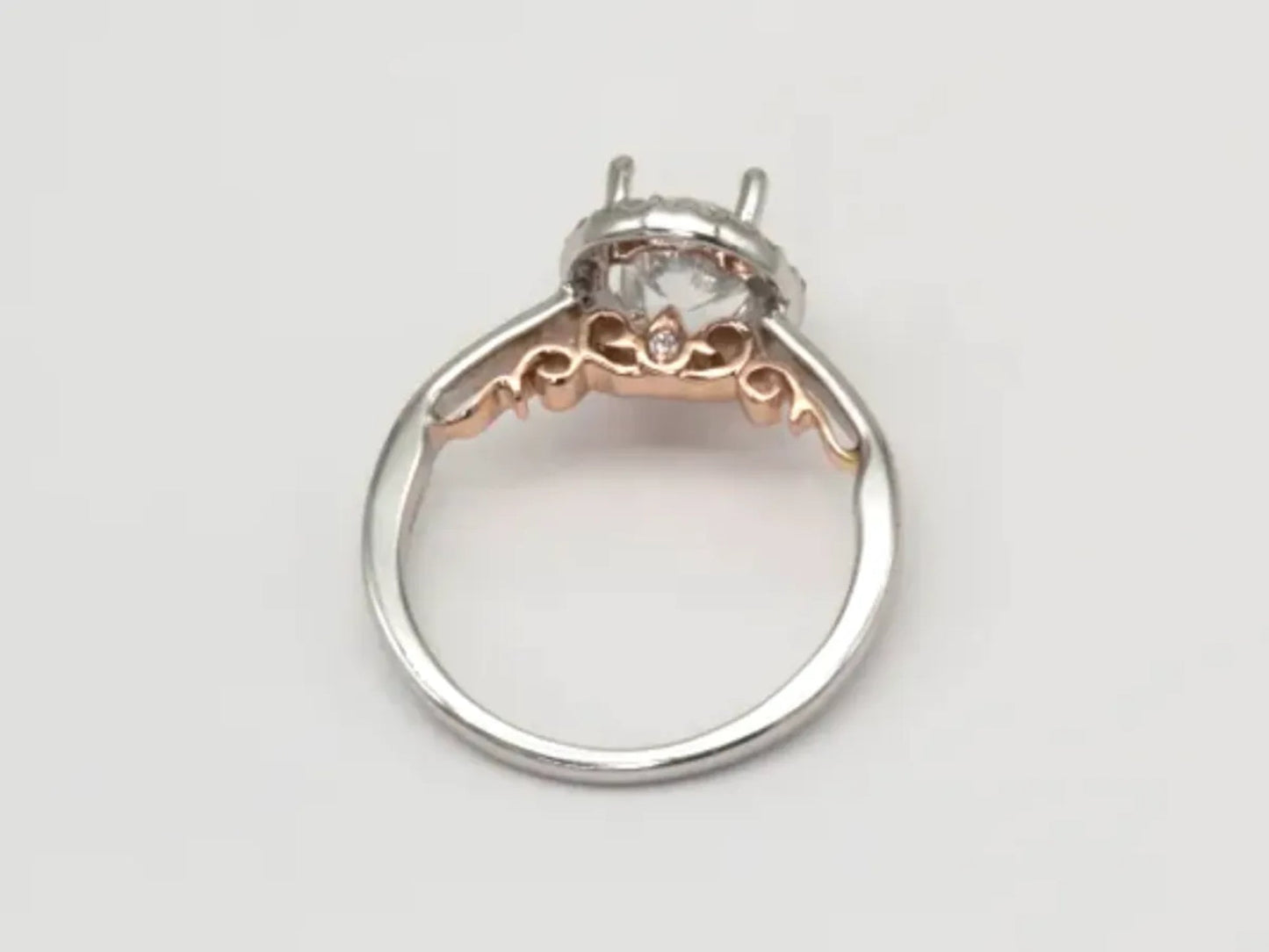 White and Rose Gold Halo Engagement Ring Gillespie Fine Jewelers