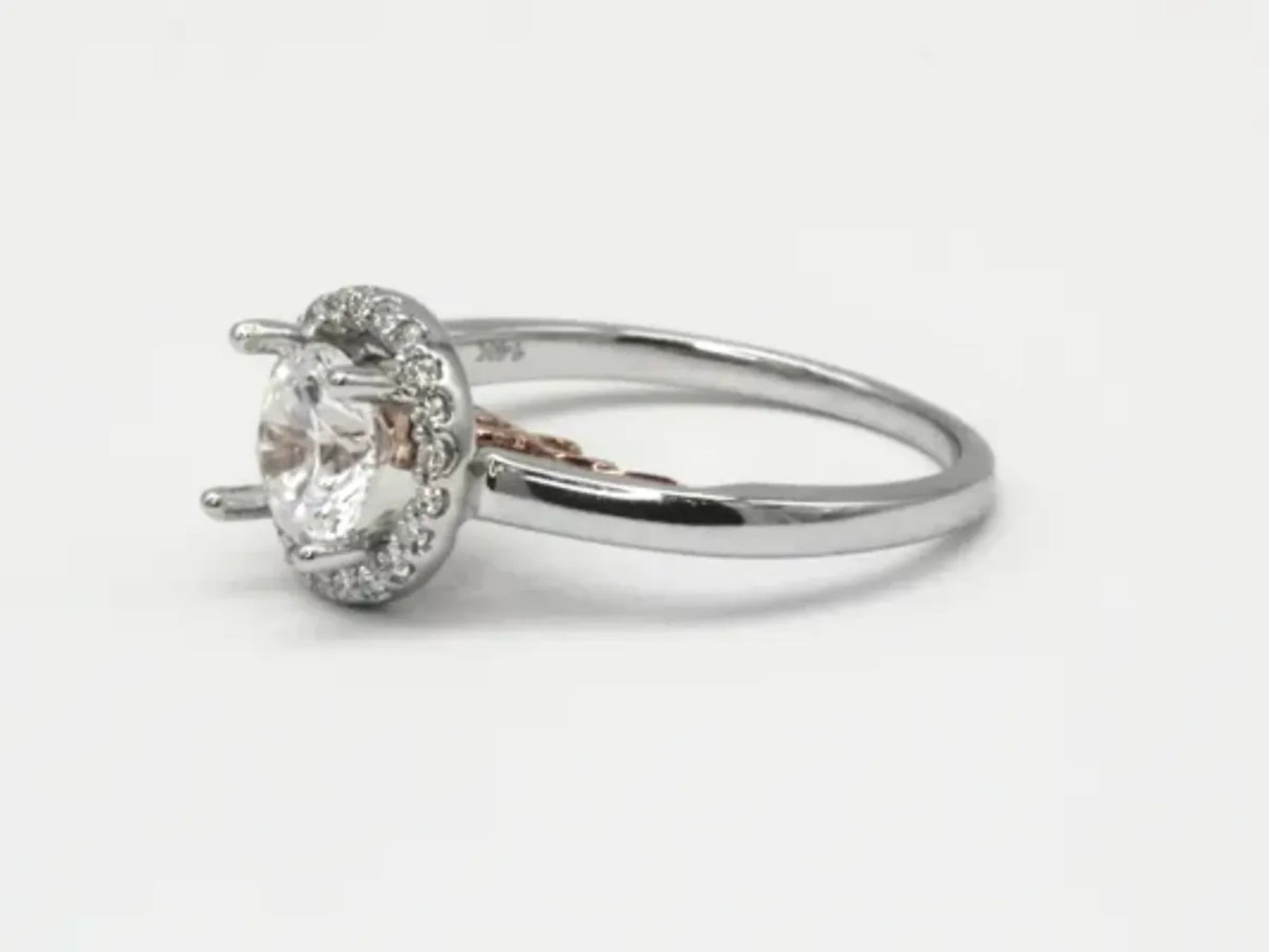 White and Rose Gold Halo Engagement Ring Gillespie Fine Jewelers